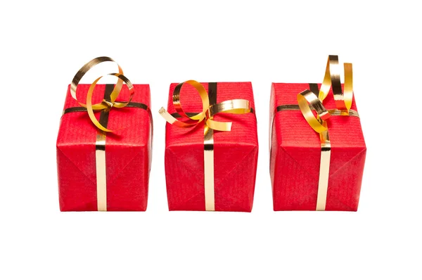 Trio van rode en gouden xmas geschenkdozen — Stockfoto