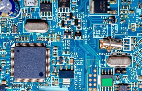 Close-up photograph of a blue circuit board — Stock Photo, Image