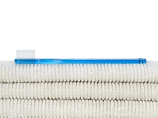 Escova de dentes e toalhas — Fotografia de Stock