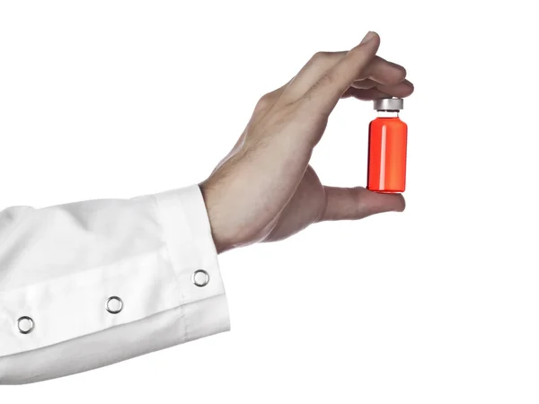 Red vial on a hand — Stock Photo, Image