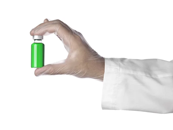 Groene flacon op een hand — Stockfoto