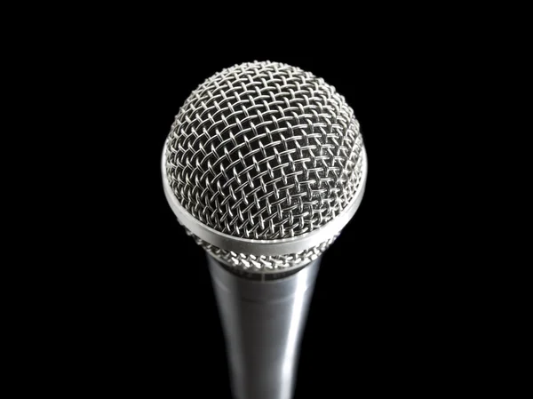 Mikrofon nad černou — Stock fotografie