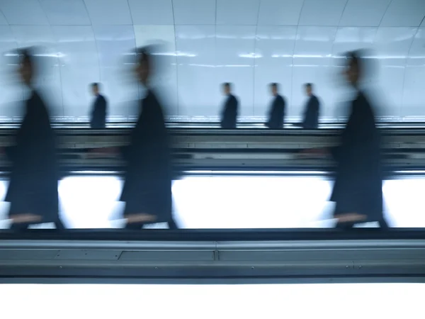 Blurred businessmen go to work — Stock Photo, Image