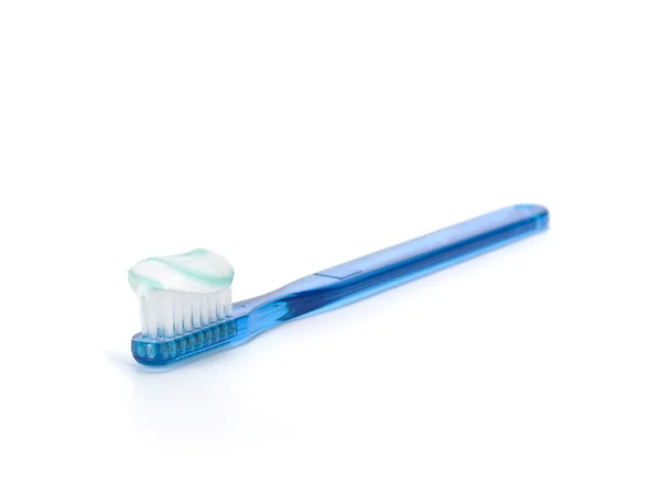Cepillo de dientes lleno de pasta de dientes —  Fotos de Stock