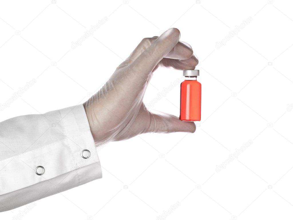Red vial on a hand