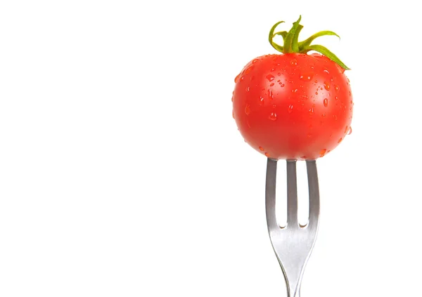 Tomate em um garfo — Fotografia de Stock