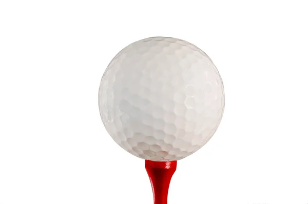 М'яч для гольфу і трійник — стокове фото