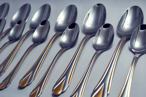 Metalen lepels en vorken — Stockfoto