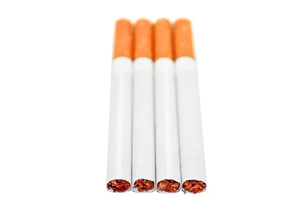 Четыре сигареты — стоковое фото