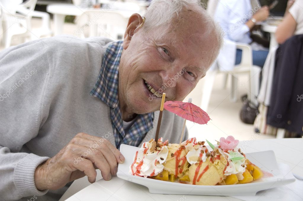 Old senior man with sundae