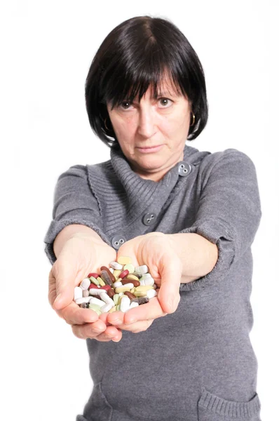 Aged woman with medicine — Stock Photo, Image
