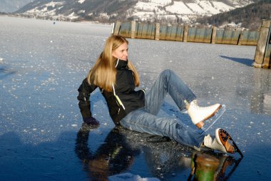 Woman ice skating clipart