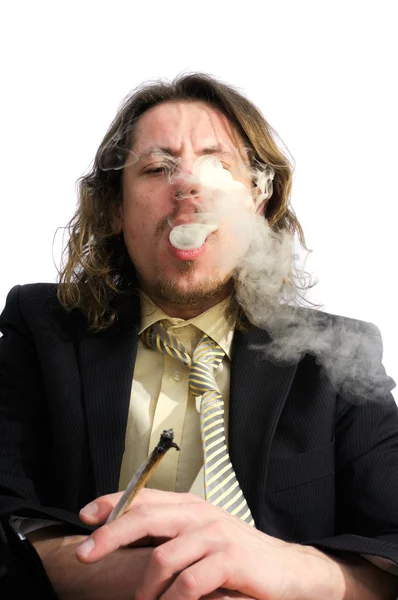 stock image Young business man smoking weed after work