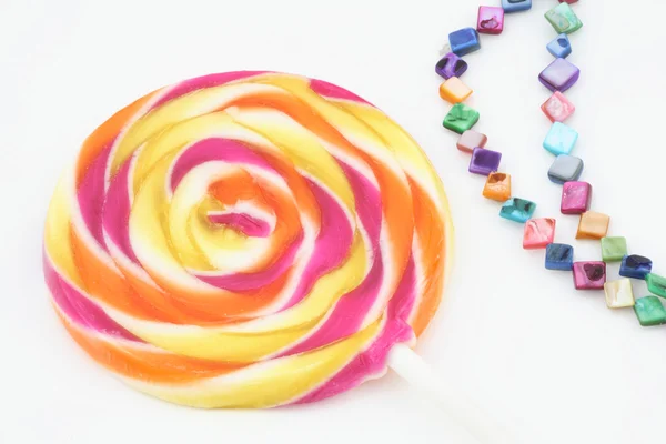 Lollipop and Necklace — Stock Photo, Image