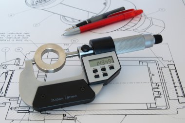 Micrometer on technical drawing clipart