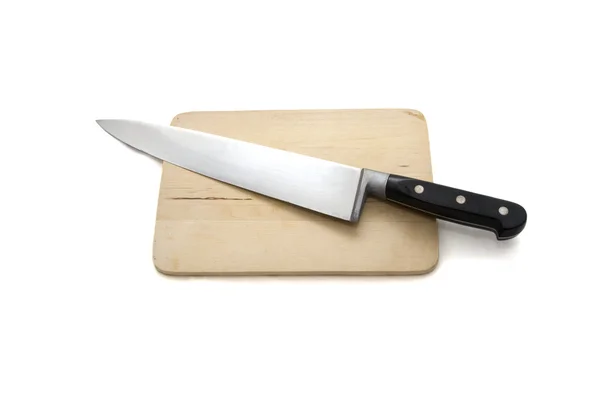 Professionell kniv på ett bräde. — Stockfoto