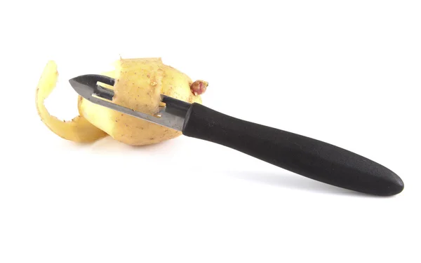 Peeling a potato — Stock Photo, Image