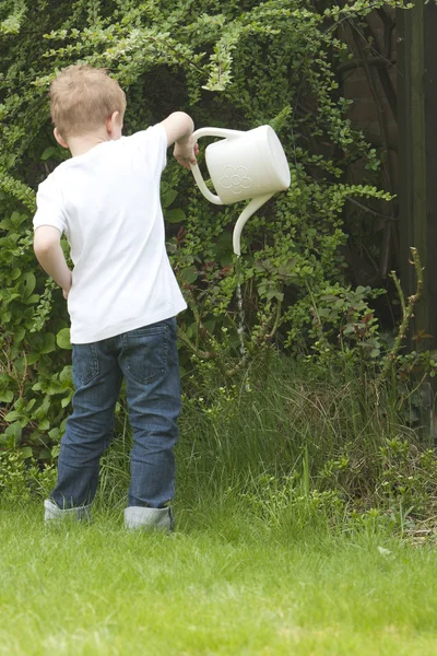 Young Boy Giving Water Plants Grass — Stock Photo, Image