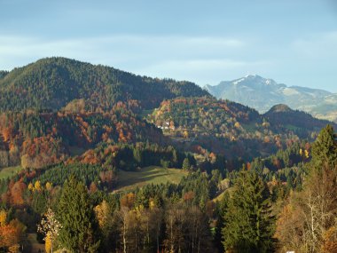 mountains close to the city of oberstdorf in germany clipart