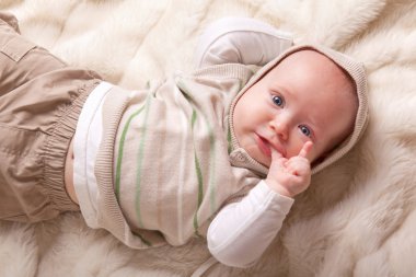 Cute baby sucking fingers clipart