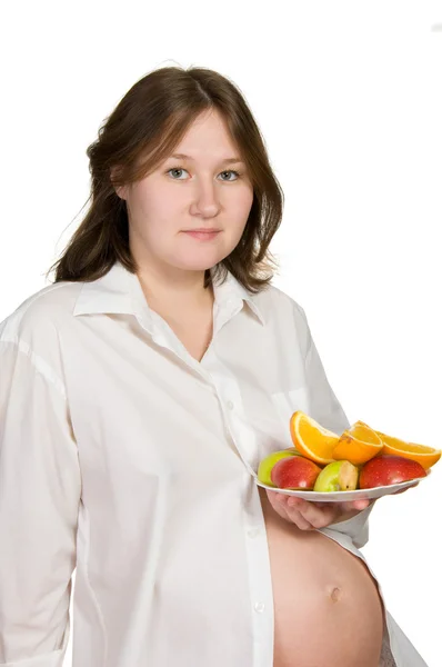 Entzückende Schwangere Frau Mit Früchten Über Weiß — Stockfoto
