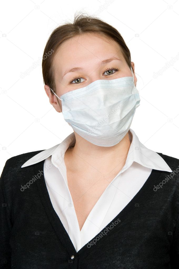 Portrait of adorable woman in facial mask over white
