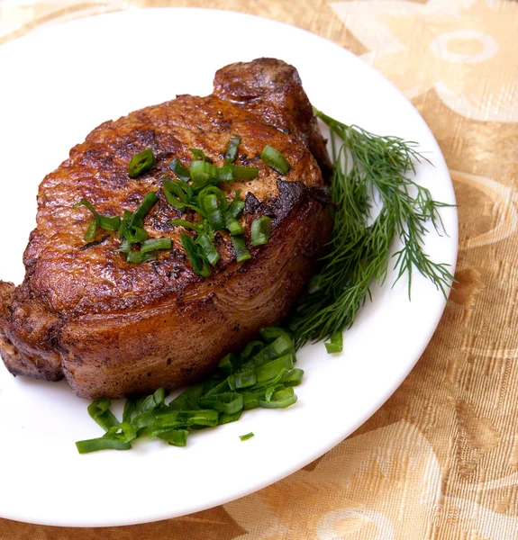 stock image Delicious fried steak with herbs