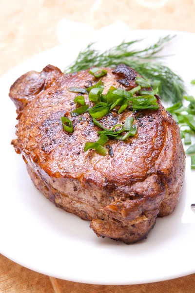 stock image Delicious fried steak with herbs