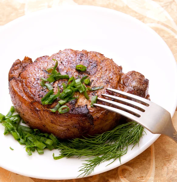 stock image Delicious fried steak with herbs