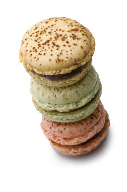 Delicious macaroons stacked (clipping path) on white background clipart
