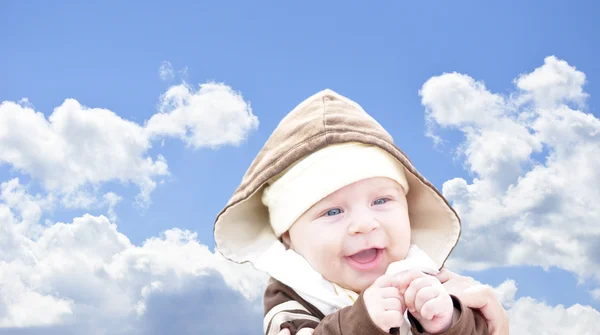 Baby och sky — Stockfoto