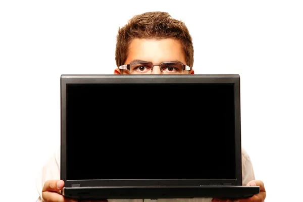 Affärsman som innehar en dator — Stockfoto