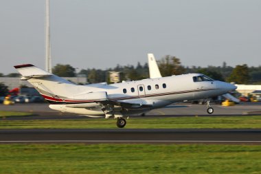 Business jet taking off clipart
