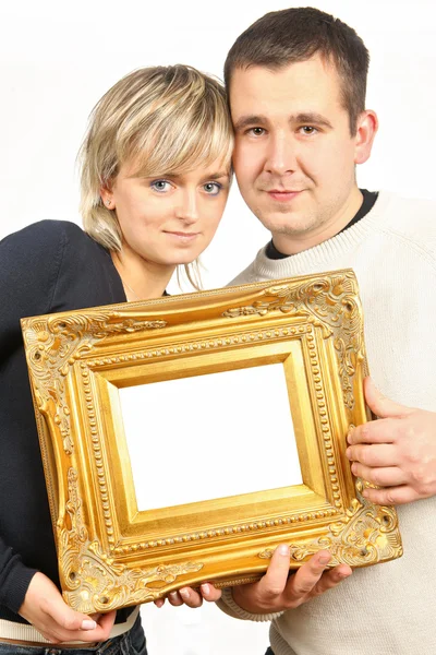 Kvinna och man med guld ram — Stockfoto