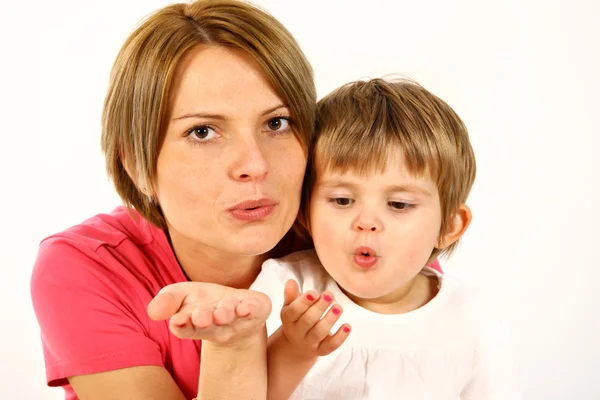 Mother and daughter sending kisses — Stock Photo, Image