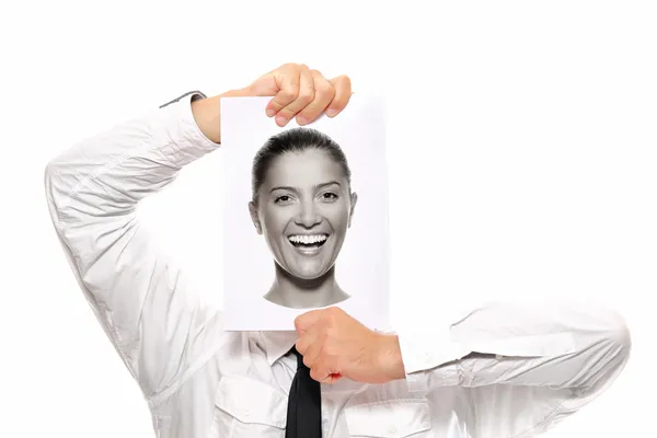 Vrouwelijke hoofd in de handen van een zakenman — Stockfoto