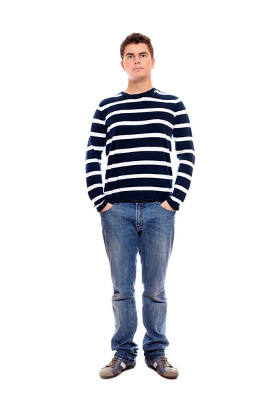 Young man standing firmly with hands in pockets — Stock Photo, Image
