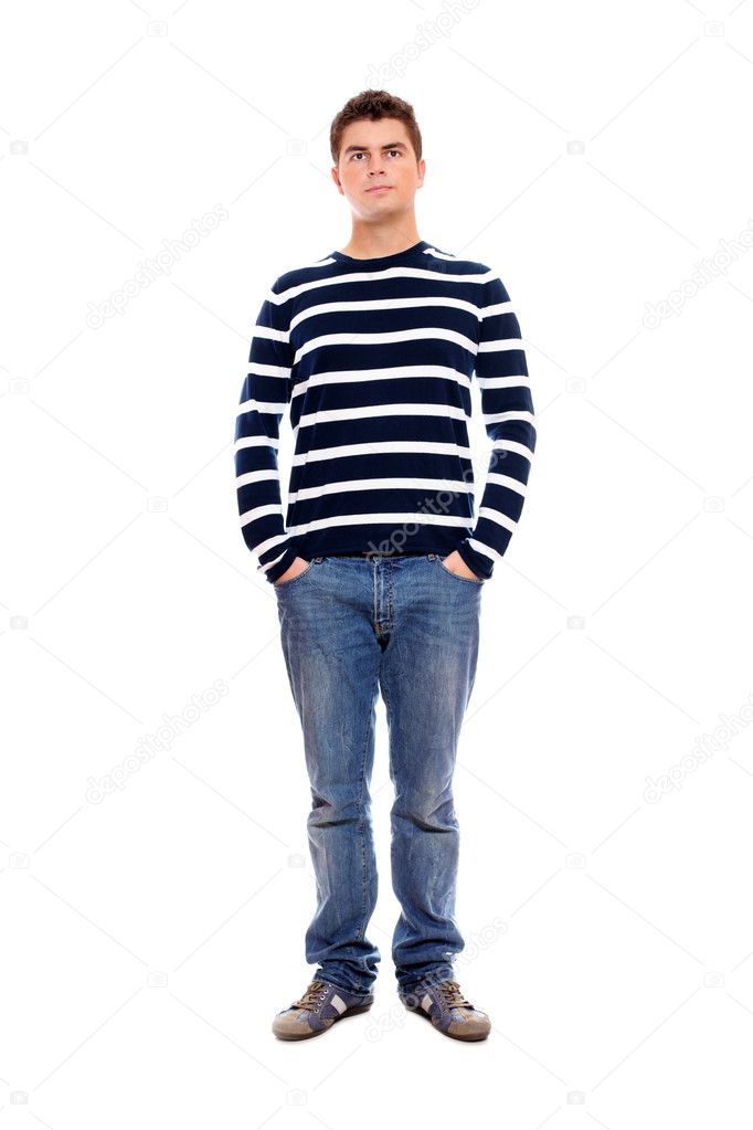 Young man standing firmly with hands in pockets