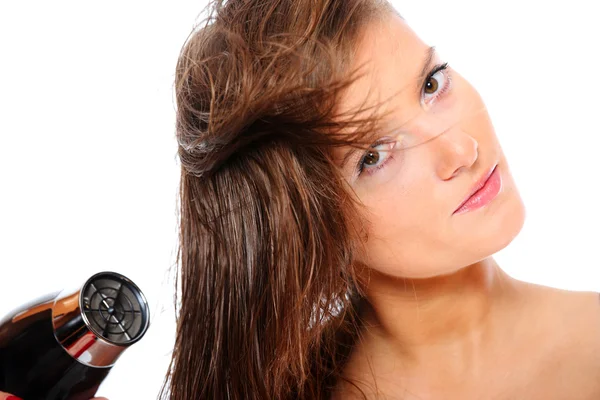 Young beautiful girl drying hair — Stock Photo, Image