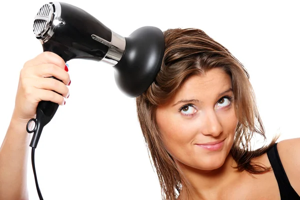 Jovem e secador de cabelo — Fotografia de Stock