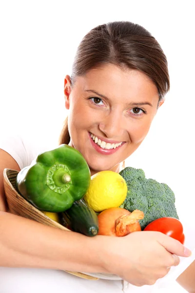 Jovem mulher e legumes — Fotografia de Stock