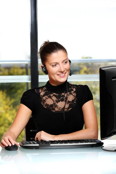 Pretty woman in the office — Stock Photo, Image