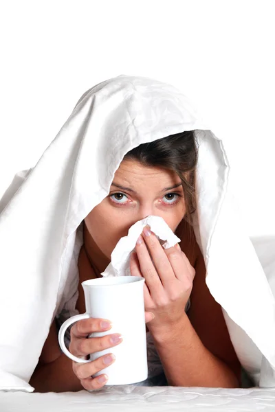 Sick woman in bed — Stock Photo, Image