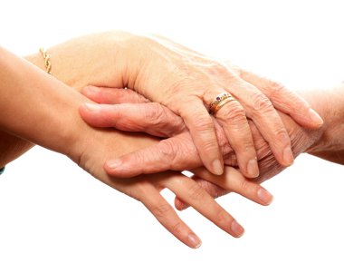 A picture of young and old hands against white background clipart