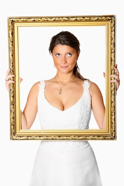 Bride with golden frame — Stock Photo, Image