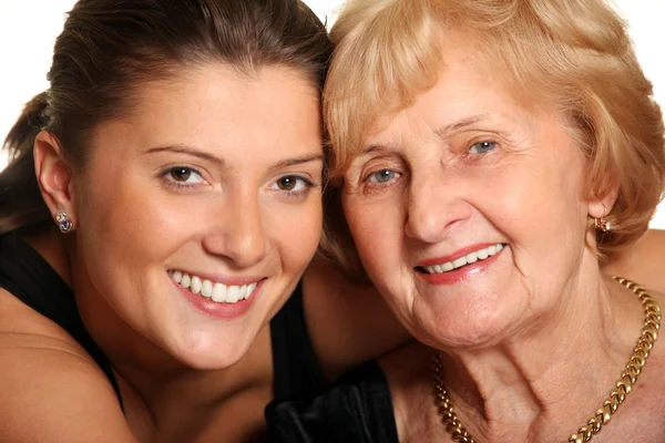 Portrait Granddaughter Hugging Her Grandma White Background — Stock Photo, Image