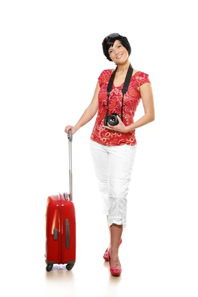 一张图片的红色行李箱和相机会在假日的幸福女人 — 图库照片