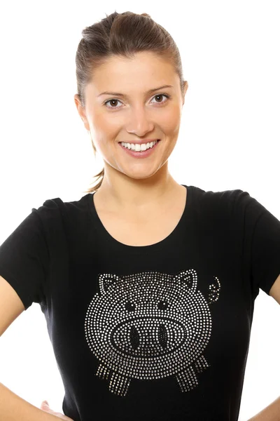 Красивая женщина в футболке со свиньей — стоковое фото