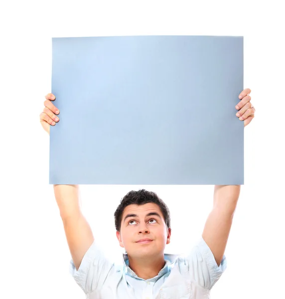 Ung man som håller en banderoll — Stockfoto