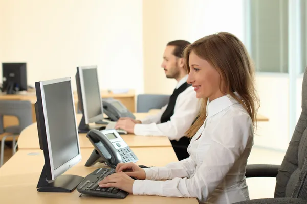 Woman and man makeing calls — Stock Photo, Image